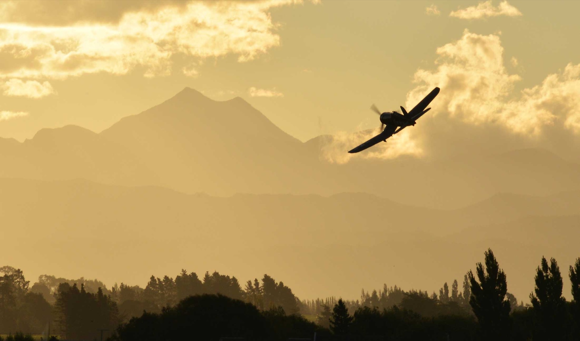 Aircraft flying at sunset